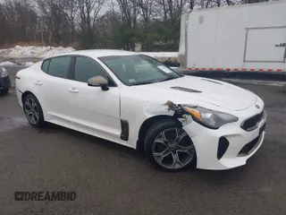 2020 Kia Stinger GT-Line with VIN KNAE15LAXL6073797, listed as a IAAI auction lot 41720932 with 83,819 mi miles. Bid and sale history available at carsss.com. Image 1.