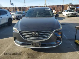 2018 Mazda CX-9 Grand Touring z VIN JM3TCADY3J0207176, wystawiony jako Copart lot #50222325 z przebiegiem 76 856 mil mil oraz Szkoda całkowita • Salvage title. Historia ofert i sprzedaży dostępna na DreamBid. Obrazek 5.