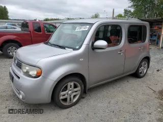 2011 Nissan Cube S z VIN JN8AZ2KR7BT203409, wystawiony jako Copart lot #57001145 z przebiegiem 127 446 mil mil oraz Tytuł czysty. Historia ofert i sprzedaży dostępna na DreamBid. Obrazek 1.