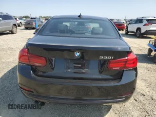 2018 BMW 3 Series 330i with VIN WBA8B9G52JNU98674, listed as a Copart auction lot 59783985 with 77,712 mi miles and Clean title. Bid and sale history available at DreamBid. Image 6.