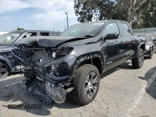 2024 GMC Canyon 4WD AT4 with VIN 1GTP6DEK5R1113223, listed as a Copart auction lot 49457395 with 8,077 mi miles and Salvage Title. Bid and sale history available at carsss.com. Image 1.