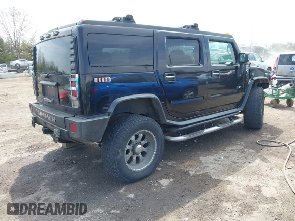 2007 Hummer H2 SUV z VIN 5GRGN23UX7H112972, wystawiony jako IAAI lot #41980625 z przebiegiem 214 857 mil mil oraz . Historia ofert i sprzedaży dostępna na DreamBid. Obrazek 4.