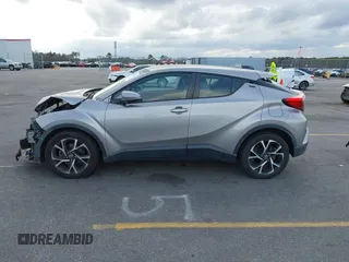 2019 Toyota C-HR XLE with VIN NMTKHMBX7KR078292, listed as a IAAI auction lot 41705966 with 104,352 mi miles. Bid and sale history available at carsss.com. Image 15.