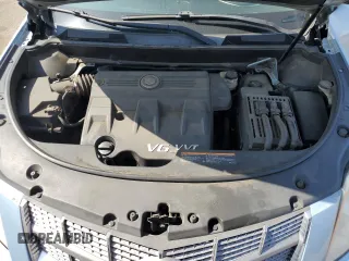 2011 Cadillac SRX z VIN 3GYFNGEY2BS575063, wystawiony jako Copart lot #60846875 z przebiegiem 158 590 mil mil oraz Szkoda całkowita • Salvage title. Historia ofert i sprzedaży dostępna na DreamBid. Obrazek 12.