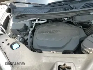 2023 Honda Passport TrailSport с VIN 5FNYF8H69PB023104, выставлен на аукционе Copart как лот 66778505 с пробегом 60 081 миль миль и Списание • Salvage title. История ставок и продаж доступна на DreamBid. Изображение 16.