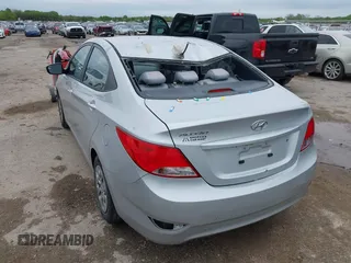 2015 Hyundai Accent GLS with VIN KMHCT4AE5FU883113, listed as a IAAI auction lot 41899701 with 123,023 mi miles and . Bid and sale history available at carsss.com. Image 6.