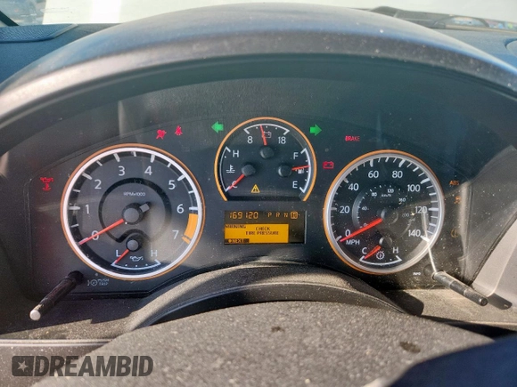 2012 Nissan Titan SV with VIN 1N6BA0ED2CN319597, listed as a Copart auction lot 62016445 with 169,120 mi miles and Salvage title. Bid and sale history available at DreamBid. Image 9.