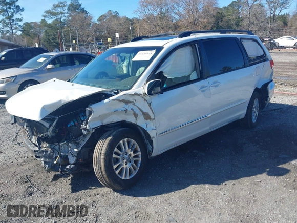 2009 Toyota Sienna XLE with VIN 5TDZK22C09S285474, listed as a IAAI auction lot 41440148 with Not Provided miles and . Bid and sale history available at DreamBid. Image 2.