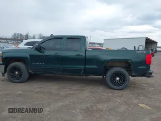 2015 Chevrolet Silverado 1500 LT with VIN 1GCVKREC1FZ342326, listed as a IAAI auction lot 41968095 with 119,911 mi miles and . Bid and sale history available at DreamBid. Image 14.