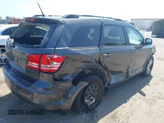 2017 Dodge Journey SE with VIN 3C4PDCAB2HT579852, listed as a IAAI auction lot 42008261 with 112,234 mi miles and . Bid and sale history available at DreamBid. Image 4.