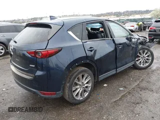 2019 Mazda CX-5 Grand Touring with VIN JM3KFBDM6K0592496, listed as a IAAI auction lot 41730103 with Not Provided miles and . Bid and sale history available at carsss.com. Image 4.