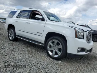 2019 GMC Yukon Denali with VIN 1GKS1CKJ6KR268230, listed as a Copart auction lot 47489035 with 49,549 mi miles and Salvage Title. Bid and sale history available at carsss.com. Image 4.