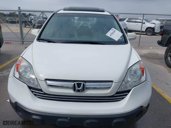 2009 Honda CR-V EX-L with VIN JHLRE38769C007979, listed as a IAAI auction lot 41582690 with 193,292 mi miles. Bid and sale history available at carsss.com. Image 12.