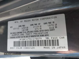 2016 Mazda Mazda3 i Grand Touring with VIN JM1BM1X79G1278079, listed as a IAAI auction lot 42010729 with 104,797 mi miles. Bid and sale history available at carsss.com. Image 9.