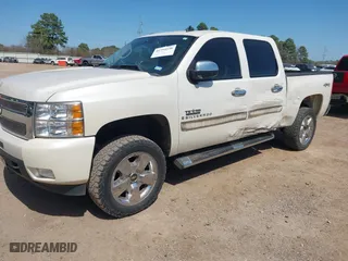 2009 Chevrolet Silverado 1500 LTZ with VIN 3GCEK33M99G156496, listed as a IAAI auction lot 41794538 with 138,829 mi miles. Bid and sale history available at carsss.com. Image 2.