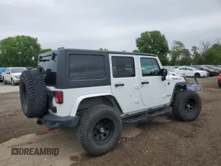 2016 Jeep Wrangler Unlimited Rubicon with VIN 1C4HJWFG9GL223928, listed as a Copart auction lot 58182125 with 57,711 mi miles and Salvage title. Bid and sale history available at DreamBid. Image 3.