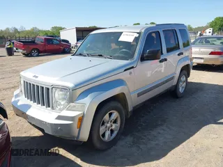 2011 Jeep Liberty Sport with VIN 1J4PN2GK6BW532799, listed as a IAAI auction lot 41985199 with 172,397 mi miles. Bid and sale history available at carsss.com. Image 2.