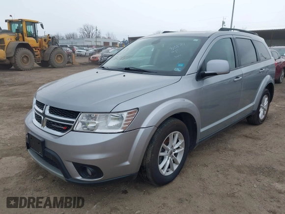 2019 Dodge Journey SE with VIN 3C4PDCBBXKT810874, listed as a IAAI auction lot 41960889 with 170,441 mi miles and . Bid and sale history available at DreamBid. Image 2.
