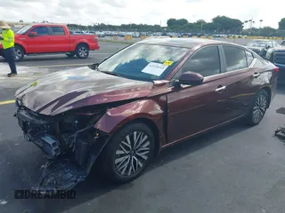 2024 Nissan Altima SV with VIN 1N4BL4DV1RN405299, listed as a IAAI auction lot 42235613 with 4,127 mi miles and . Bid and sale history available at DreamBid. Image 2.