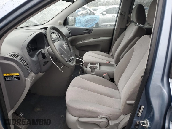 2012 Kia Sedona LX with VIN KNDMG4C70C6465733, listed as a Copart auction lot 52017215 with 149,800 mi miles and Salvage Title. Bid and sale history available at carsss.com. Image 7.
