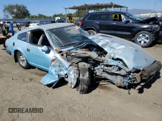 1979 Datsun 280ZX z VIN HS130123182, wystawiony jako Copart lot #61076424 z przebiegiem 48 711 mil mil oraz Szkody całkowita. Historia ofert i sprzedaży dostępna na DreamBid. Obrazek 4.