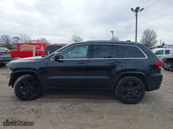 2015 Jeep Grand Cherokee Altitude with VIN 1C4RJFAG2FC956607, listed as a IAAI auction lot 41818479 with 98,879 mi miles. Bid and sale history available at carsss.com. Image 14.