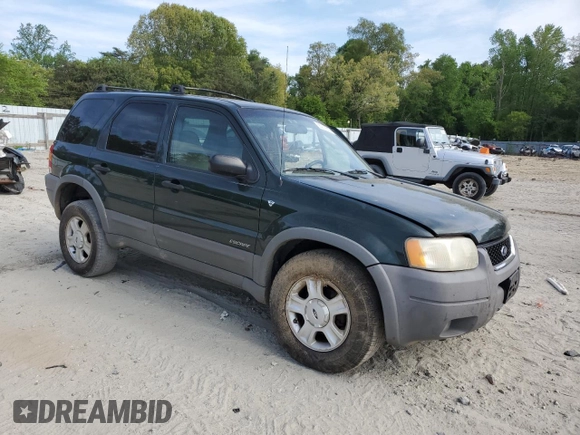 2001 Ford Escape XLT with VIN 1FMCU04181KF62444, listed as a Copart auction lot 55272615 with 265,129 mi miles and Salvage title. Bid and sale history available at DreamBid. Image 4.