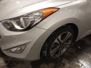 2013 Hyundai Elantra Coupe SE with VIN KMHDH6AEXDU022783, listed as a IAAI auction lot 41595832 with 153,330 mi miles. Bid and sale history available at carsss.com. Image 13.