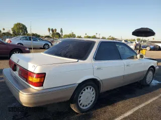 1990 Lexus ES z VIN JT8VV22T5L0096463, wystawiony jako Copart lot #70032254 z przebiegiem 127 414 mil mil oraz Szkoda całkowita • Salvage title. Historia ofert i sprzedaży dostępna na DreamBid. Obrazek 3.