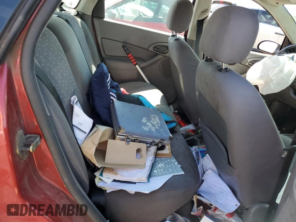 2004 Ford Focus ZX5 z VIN 3FAFP37384R124844, wystawiony jako Copart lot #69492924 z przebiegiem 155 129 mil mil oraz Szkoda całkowita • Salvage title. Historia ofert i sprzedaży dostępna na DreamBid. Obrazek 10.