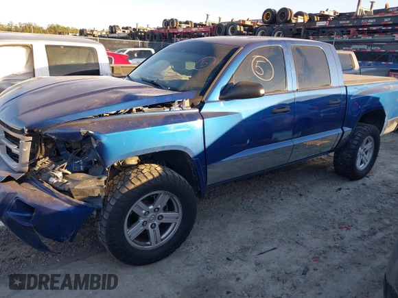 2010 Dodge Dakota Bighorn/Lonestar with VIN 1D7CW3GP5AS130870, listed as a IAAI auction lot 40929651 with 128,077 mi miles. Bid and sale history available at carsss.com. Image 16.