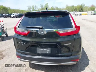 2018 Honda CR-V EX-L z VIN 7FARW2H82JE021578, wystawiony jako IAAI lot #42215280 z przebiegiem 82 571 mil mil oraz . Historia ofert i sprzedaży dostępna na DreamBid. Obrazek 16.