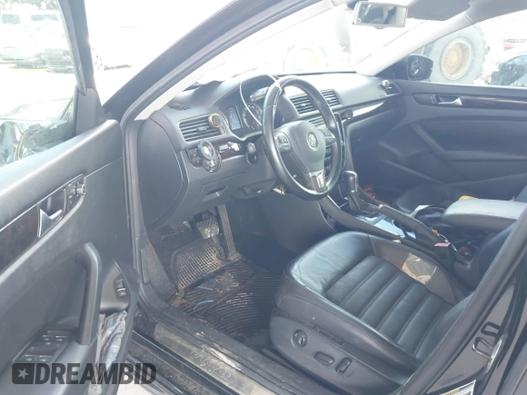 2014 Volkswagen Passat SEL Premium with VIN 1VWCN7A37EC071313, listed as a IAAI auction lot 42796404 with 78,444 mi miles and . Bid and sale history available at DreamBid. Image 5.