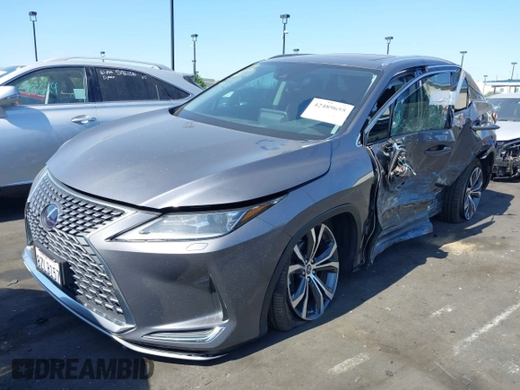 2022 Lexus RX 450h with VIN 2T2HGMDA4NC077617, listed as a IAAI auction lot 42489655 with 37,683 mi miles and . Bid and sale history available at DreamBid. Image 2.