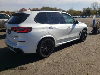 2020 BMW X5 M50i with VIN 5UXJU4C06L9C45320, listed as a Copart auction lot 74911604 with 78,465 mi miles and Salvage Title. Bid and sale history available at carsss.com. Image 3.