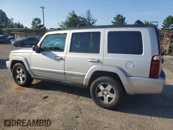 2010 Jeep Commander Sport with VIN 1J4RG4GK4AC125711, listed as a Copart auction lot 60369545 with 209,522 mi miles and Clean title. Bid and sale history available at DreamBid. Image 2.