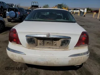 2001 Lincoln Continental z VIN 1LNHM97V31Y673523, wystawiony jako Copart lot #52451385 z przebiegiem 133 879 mil mil oraz Szkoda całkowita • Salvage title. Historia ofert i sprzedaży dostępna na DreamBid. Obrazek 6.