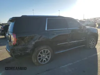 2018 GMC Yukon Denali with VIN 1GKS1CKJ0JR106589, listed as a Copart auction lot 79977034 with 98,022 mi miles and Salvage Title. Bid and sale history available at carsss.com. Image 3.