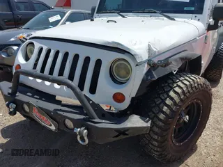 2013 Jeep Wrangler Unlimited Sport with VIN 1C4BJWDGXDL694054, listed as a IAAI auction lot 42097708 with 130,360 mi miles and . Bid and sale history available at DreamBid. Image 6.