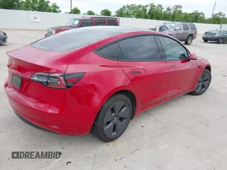 2023 Tesla Model 3 with VIN 5YJ3E1EA0PF455058, listed as a IAAI auction lot 42201618 with 31,147 mi miles and . Bid and sale history available at DreamBid. Image 4.
