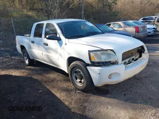 2007 Mitsubishi Raider LS with VIN 1Z7HC28K37S234275, listed as a IAAI auction lot 41656693 with 200,354 mi miles. Bid and sale history available at carsss.com. Image 1.