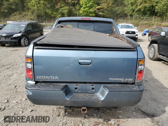 2007 Honda Ridgeline RTX z VIN 2HJYK16317H514476, wystawiony jako Copart lot #74274954 z przebiegiem Nie podano mil oraz Nie do naprawy • Non repairable. Historia ofert i sprzedaży dostępna na DreamBid. Obrazek 6.
