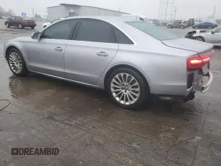 2015 Audi A8 z VIN WAUJGAFD0FN010021, wystawiony jako Copart lot #86861684 z przebiegiem 112 697 mil mil oraz Szkoda całkowita • Salvage title. Historia ofert i sprzedaży dostępna na DreamBid. Obrazek 2.