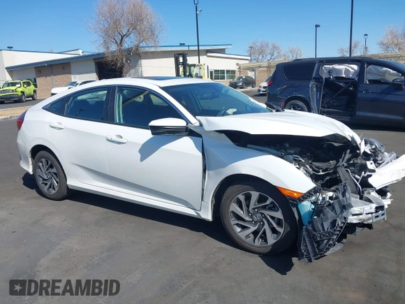 2018 Honda Civic EX with VIN 2HGFC2F71JH502564, listed as a IAAI auction lot 41933157 with 56,696 mi miles and . Bid and sale history available at DreamBid. Image 13.