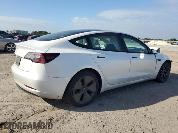 2021 Tesla Model 3 Standard Range Plus with VIN 5YJ3E1EA4MF089259, listed as a Copart auction lot 75398924 with 32,166 mi miles and Salvage Title. Bid and sale history available at DreamBid. Image 3.