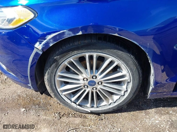 2014 Ford Fusion SE Hybrid with VIN 3FA6P0LU3ER219620, listed as a IAAI auction lot 41560424 with 153,681 mi miles. Bid and sale history available at carsss.com. Image 6.