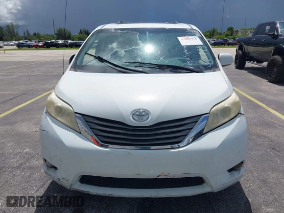 2014 Toyota Sienna XLE with VIN 5TDYK3DC4ES414728, listed as a IAAI auction lot 42588916 with 291,007 mi miles and . Bid and sale history available at DreamBid. Image 6.
