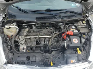 2013 Ford Fiesta SE z VIN 3FADP4BJ9DM108667, wystawiony jako Copart lot #58542295 z przebiegiem 94 812 mil mil oraz Szkoda całkowita • Salvage title. Historia ofert i sprzedaży dostępna na DreamBid. Obrazek 11.