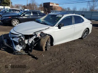 2024 Toyota Camry SE with VIN 4T1T11AK9RU231996, listed as a Copart auction lot 43810455 with 18,873 mi miles and Salvage Title. Bid and sale history available at carsss.com. Image 1.