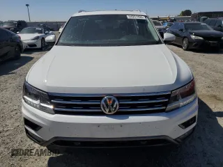 2019 Volkswagen Tiguan SE with VIN 3VV2B7AX5KM009947, listed as a Copart auction lot 54951455 with 90,569 mi miles and Salvage Title. Bid and sale history available at DreamBid. Image 5.